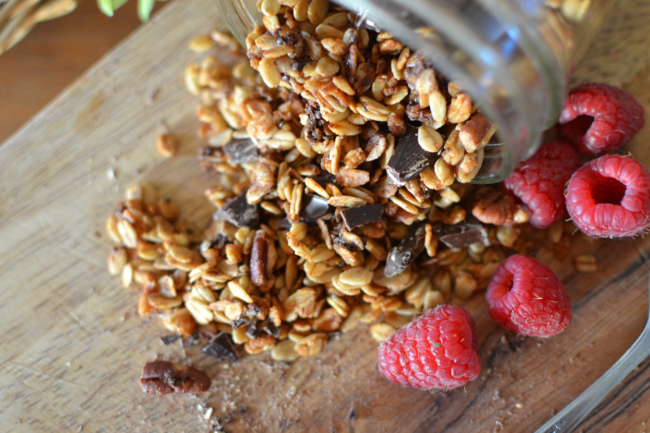 Crispy granola with chocolate chunks and raspberries