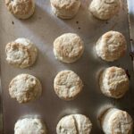 Baked biscuits on a cookie sheet