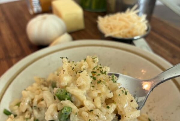 Cooked rice and asparagus in a bowl