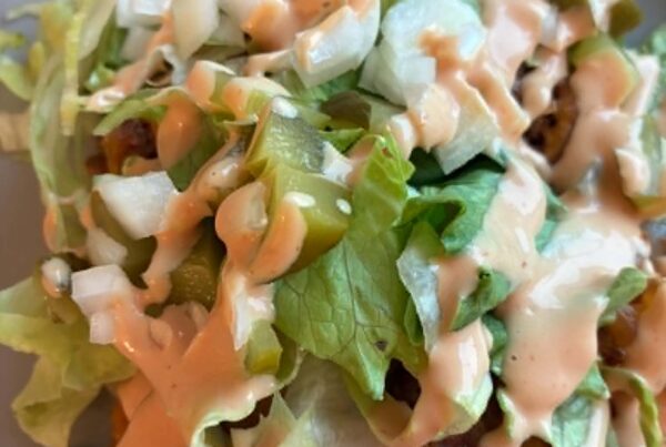 Loaded fries with fresh lettuce toppings